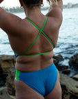 Back of the full coverage JAYD Swimwear Ibiza one piece in nordic with contrasting moss green cross-back shoulder straps.