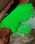 JAYD Swimwear, Zimmy one piece in the splice colour being splashed by water.