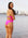Athlete Jenaya wear a contrasting fixed back one piece called the Airlie. This piece is our fullest coverage and is made from chlorine resistant material. She is seen wearing the colour Pink Sorbet with contrasting Splice straps which are adjustable.
