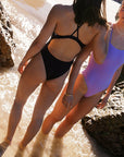 JAYD Swimwear fixed back one piece in both Acai and Lilac Haze colours. This one piece is very supportive and offers mid-coverage.