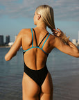 JAYD Swimwear athlete Keira wears the fixed back Finely one piece. It has customised contrasting straps made from chlorine resistant material. This is the cheekiest cut.
