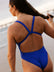 Ski Paddling athlete Jenaya wears the wider strapped fixed back one piece by JAYD Swimwear, in the colour Cobalt. This mid coverage one piece is called the Soraya.