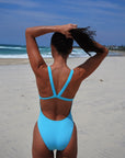 JAYD Swimwear design a thicker strapped fixed back one piece in the colour Mykonos. As worn by a triathlete, it is built for comfort and performance.