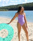 Front view of JAYD Swimwear's full-coverage athletic one-piece Airlie in the shade Lilac Haze.