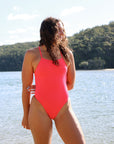 JAYD Swimwear showcases the front view of athletic one piece Tallow in the JAYD shade Fiesta