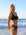 Front view of model wearing JAYD Swimwear cheeky bikini bottom Demi in Black.