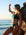Model on a rock wearing JAYD Swimwear mid-coverage bikini bottoms Tahiti in Cove.