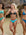 Front view of model wearing JAYD Swimwear athletic Triangle training bikini top in Carbon.