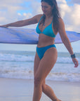Side view of JAYD Swimwear Cali athletic bikini bottoms in Nordic Blue by JAYD Swimwear.
