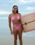 Front view of seamless, athletic, full coverage JAYD Swimwear Connie bikini bottoms in Fairy Floss Pink.