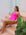 Front view of model wearing Riva Tie-Back athletic one piece swimsuit by JAYD Swimwear, in Pink Sorbet.