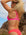 Back view of model wearing JAYD Swimwear athletic Tazzie training bikini top in Pink Sorbet.