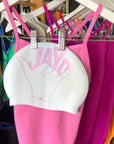 Pink Shaka JAYD swim cap paired with pink JAYD one piece swimsuits