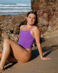 Female athlete in JAYD Swimwear Albi One Piece Murasaki colour, designed for ocean swims, pool training, and surf life saving