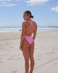 The Levanto One Piece swimsuit by JAYD Swimwear, in Fairy Floss. Wide cross over shoulder straps ensure maximum support, tension distribution and comfort.