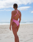 The Levanto One Piece swimsuit by JAYD Swimwear, in Fairy Floss. Open back design for minimal tan lines.