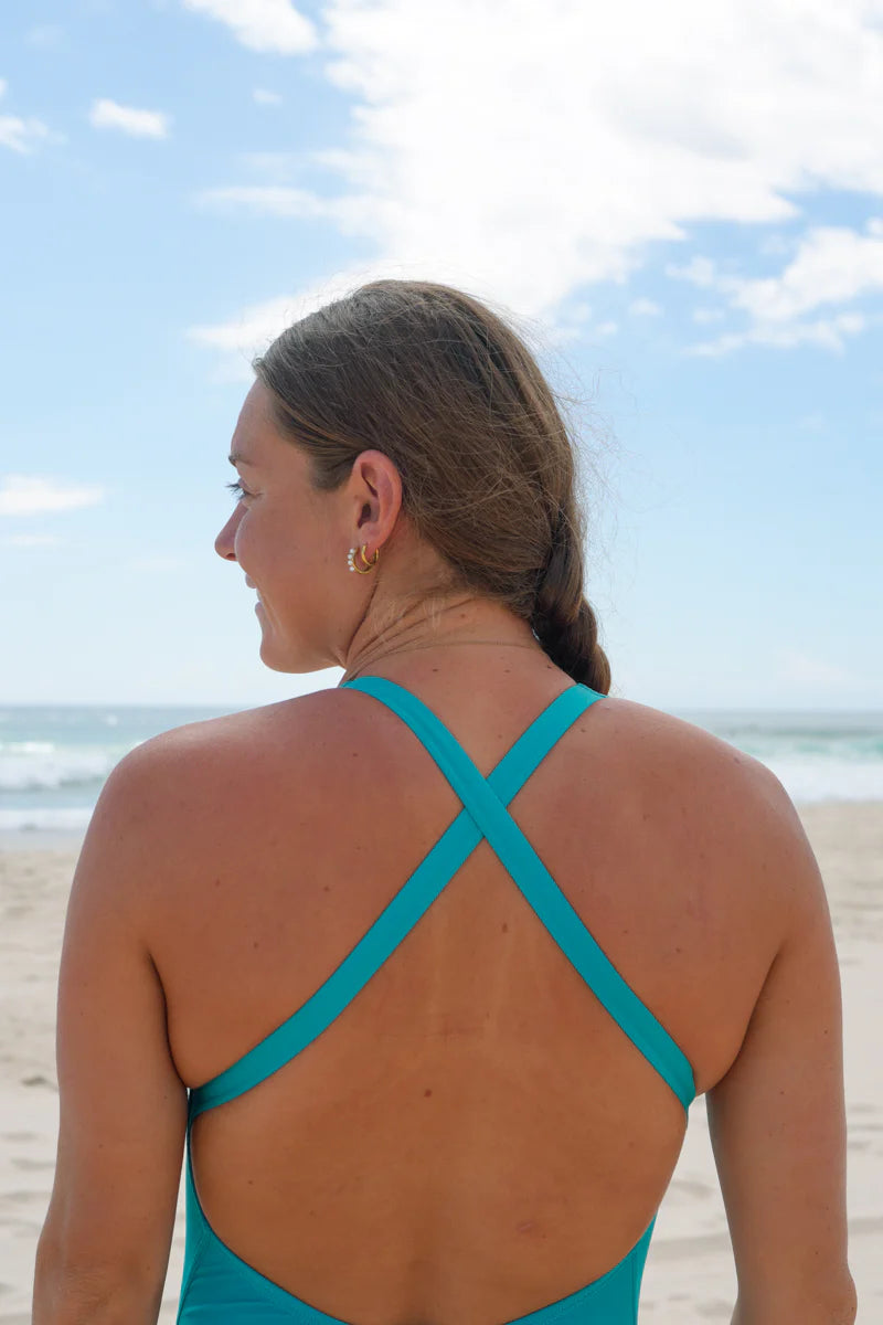 The Levanto One Piece swimsuit by JAYD Swimwear, in Atlantic. Open back straps over the shoulders.