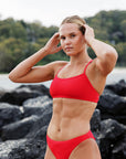 The JAYD Swimwear Torquay Bikini Top is all about support and minimalist design. This Ruby red shade is not only designed for comfort, but will stand out in any crowd.