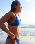 Side view of JAYD Swimwear Tazzie athletic bikini top in Cobalt Blue