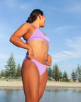 Close view of seamless JAYD Swimwear Cali athletic bikini bottoms in Lilac Haze