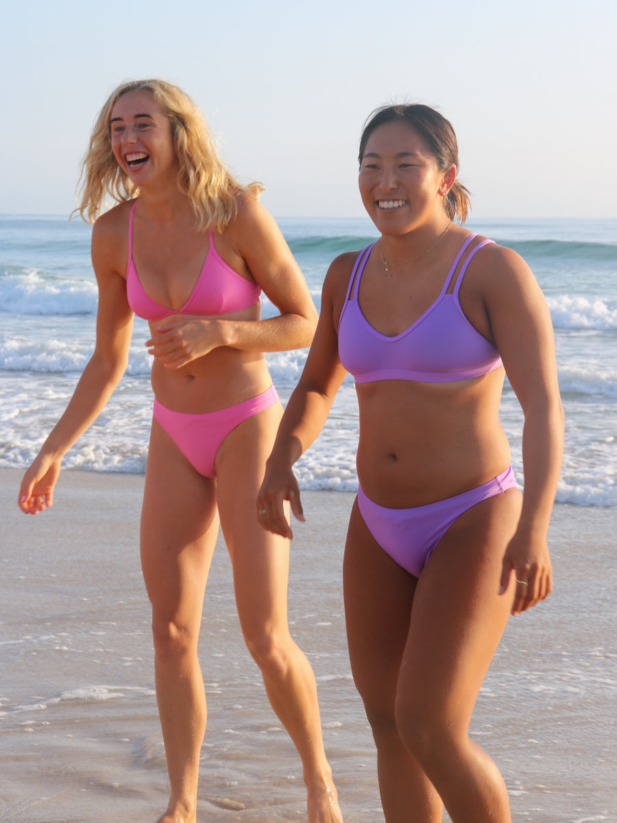 Front view of seamless, athletic, cheeky coverage JAYD Swimwear Minnie bikini bottoms in Fairy Floss pink.