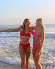 Front view of JAYD Swimwear Tazzie athletic bikini top in Ruby Red