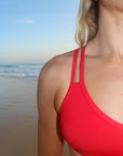 Close view of JAYD Swimwear Tazzie athletic bikini top in Ruby Red