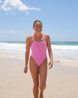 Front view of Apsley One Piece Athletic Swimsuit in Fairy Floss Pink by JAYD Swimwear