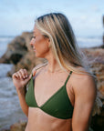 JAYD Swimwear model wearing the Kiama bikini top in olive green.