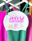 JAYD Swimwear white swim cap with cowboy boots and cactus illustrations.