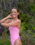 Think pink with the JAYD Swimwear Zambia Fairy Floss One Piece, complete with contrasting pink sorbet shoulder straps and side cutouts to add a splash of vibrancy to your swimwear collection.