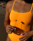 JAYD Swimwear Zimmy one piece athletic swimsuit in the colour sunshine, Up close image of the front of the suit.