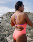 JAYD Swimwear model Sara wearing the high performance Airlie one piece swimsuit in Vibe with contrasting Lilac Haze shoulder straps and back band.