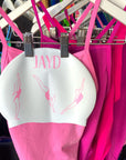 Pink JAYD one pice swimsuits matching Dive In pink swim cap design.