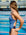 JAYD model standing in front of a pool wearing the Ibiza one piece swimsuit in storm blue with contrasting purple acai hip panels.