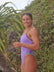 Lucy Derbyshire's favourite swimsuit; the JAYD Swimwear Zambia One Piece, highlighting the Lilac Haze base and Açaí contrast detailing during a coastal training session.
