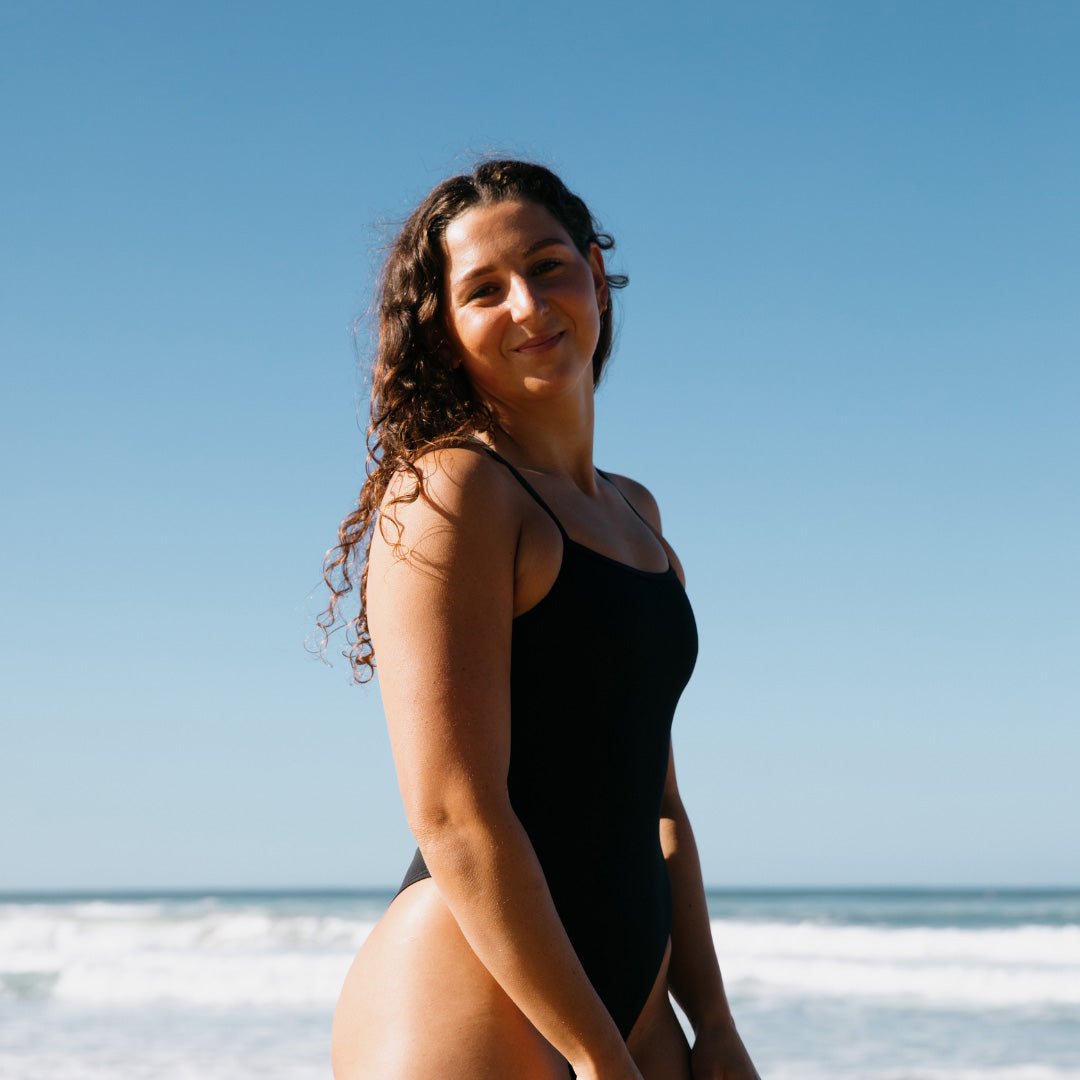 JAYD Swimwear open water swimmer Madi Armstrong wears he fixed back one piece called Albi in the colour black