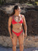 Athlete Sara wears the chlorine resistant athletic swim top by JAYD swimwear in the colour Ruby. This is a fixed back design called Kiama.