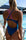 Back view of JAYD Swimwears athletic one piece called the Breeza. Liv is standing poolside in the colour Nordic, with contrasting fairy floss  strap detailing.