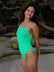 JAYD Swimwear Zambia fixed back one piece worn on triathlete Ana. She is wearing the colour Meadow with contrasting Vibe hip cut-out detailing and straps. This piece is made from chlorine resistant material.