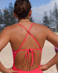 Back view of JAYD Swimwear full coverage tie back athletic one piece: Riva in Fiesta