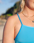Premium Italian fabric one piece swimsuit, Albi style in Waikiki blue with Cancun strap contrast designed by JAYD Swimwear in collaboration with Madi Armstrong