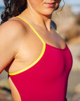 Detailing of popular JAYD Swimwear style Lennox. Open water swimmer Madi Armstrong wears it in the colour Tart with contrasting Daffodil shoulder straps..