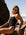 Athlete Claudia wearing the fixed back Zambia one piece in black, with contrasting Lilac straps. Suit is chlorine resistant.