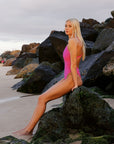 JAYD Swimwear athlete Keira wears the Soraya one piece, in the colour Pink Sorbet. This one piece is made from chlorine resistant material and is made to move.