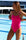 JAYD Swimwear features the athletic Zimmy one piece, in the colour pink sorbet, next to the swimming pool. Material is chlorine resistant.