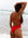 JAYD-Swimwear, Athletic Zimmy one piece in the Ruby colour. Lauren is enjoying the beach and shallows of the water