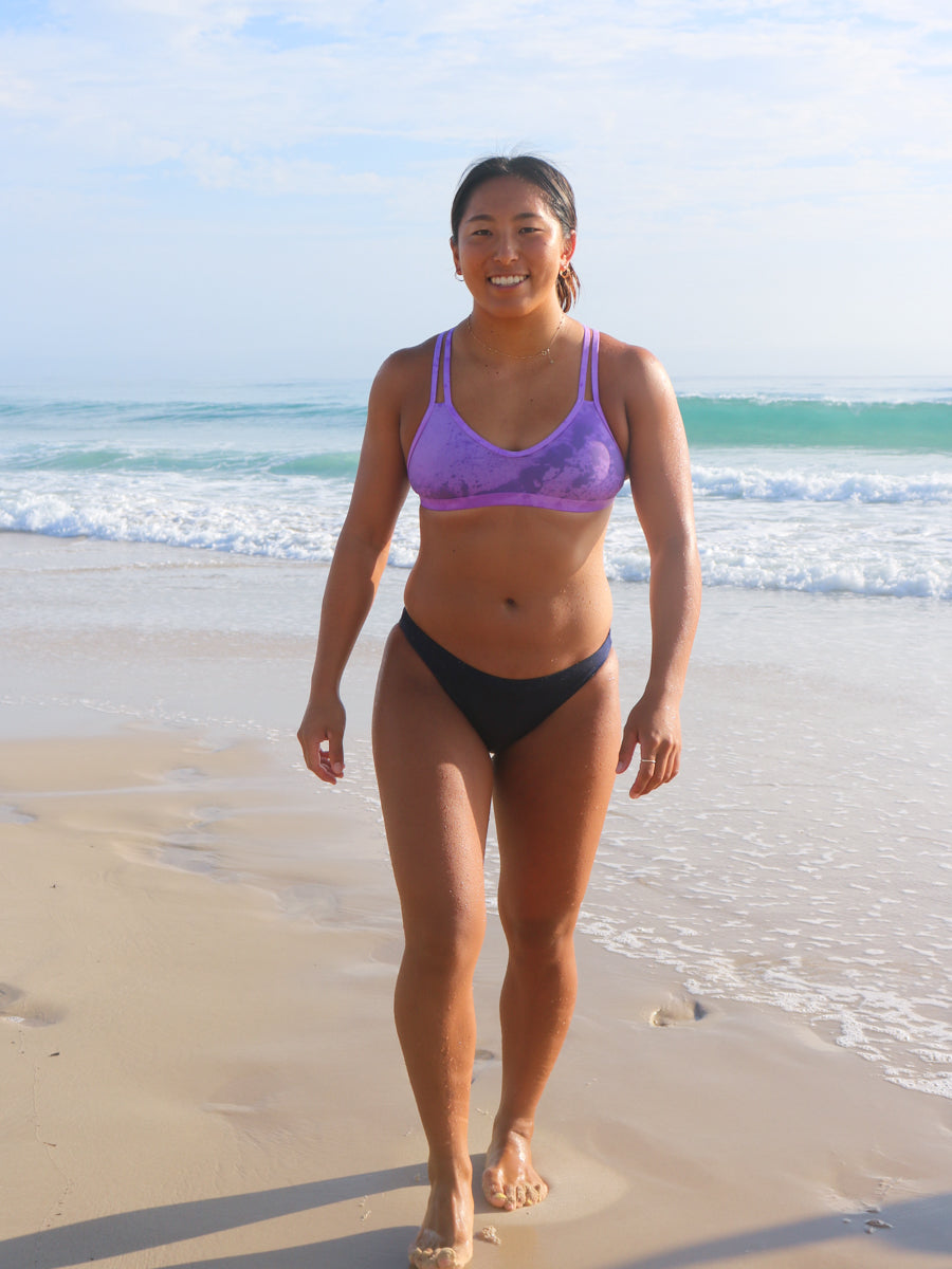 Front view of seamless, athletic, full coverage JAYD Swimwear Cali bikini bottoms in Navy blue.