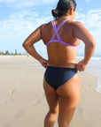 Back view of seamless, athletic, full coverage JAYD Swimwear Cali bikini bottoms in Navy blue.