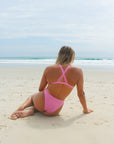 Back view of JAYD Swimwear Cali athletic bikini bottoms in Fairy Floss Pink.